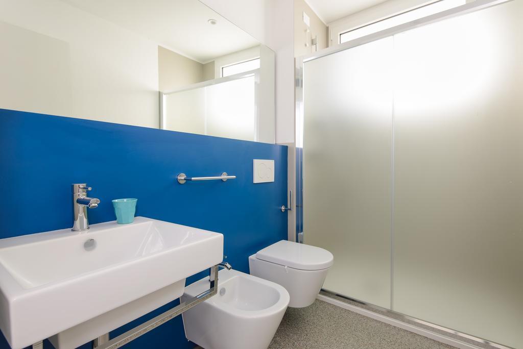 Residenza Edda Apartment Lignano Sabbiadoro Cameră foto